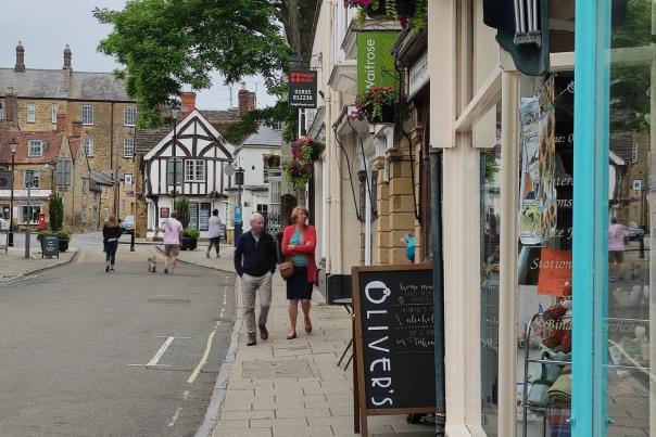 Shoppers walking down Cheap Street in Sherborne