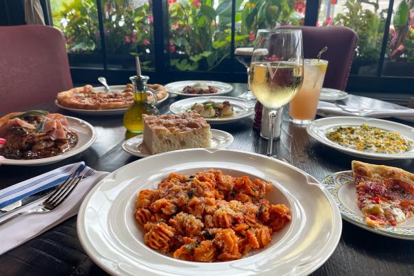 A table at Valentina's full of Italian food.