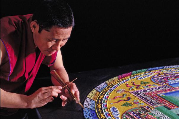 Monk preparing Mandala sand painting
