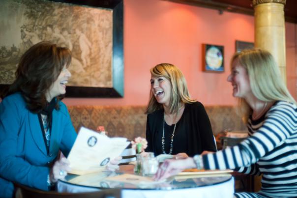 Girlfriends laughing at Cafe Intermezzo