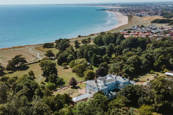 A bird's-eye view of the East Yorkshire coast, showing Sewerby Hall and the coastline stretching out into the distance