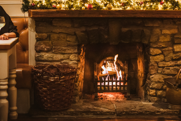 Diners enjoying the real fire at The Triton Inn in Brantingham, East Yorshire