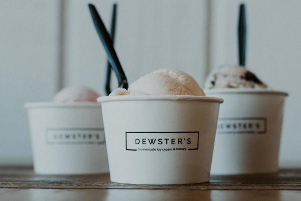 Three cups of Dewster's homemade ice cream in various flavors