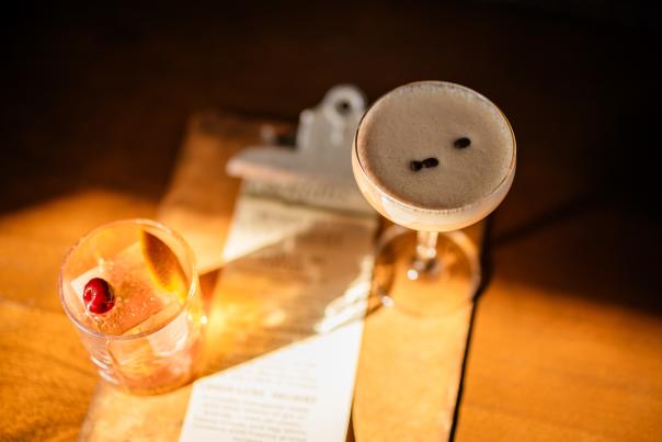 Two cocktails and a menu at Revival Vintage Spirits Bar in Elizabethtown, KY.
