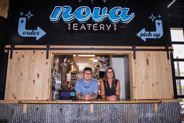 Nikki and Ryan behind Nove Eatery counter