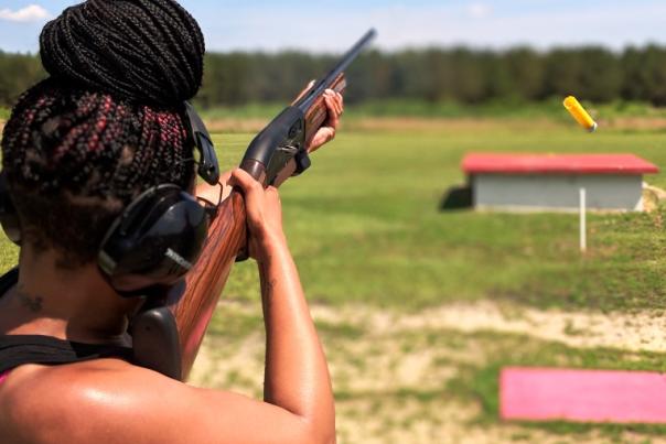 Image of young, black lays shooting at the Fort Bragg Clay Target Center
