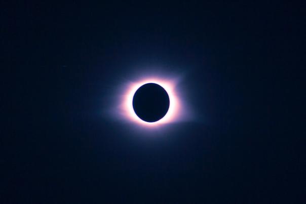 image of the moon eclipsing the sun