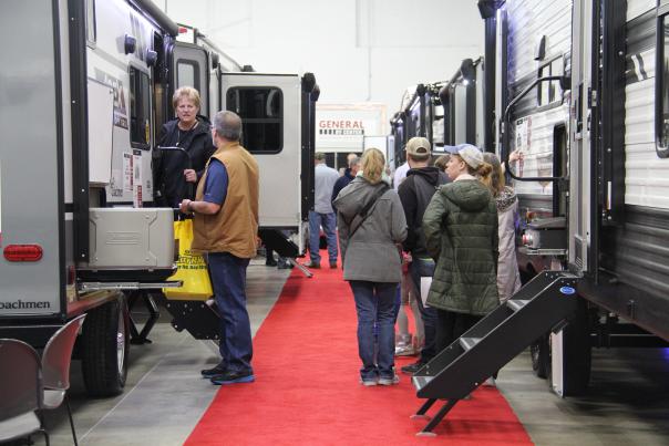 Families shop for campers at the Dort Financial Center.