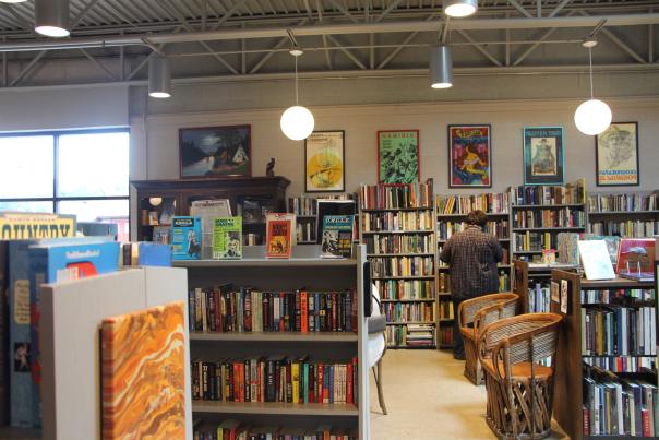 A customer looks at book at Totem Books in Flint, Michigan.
