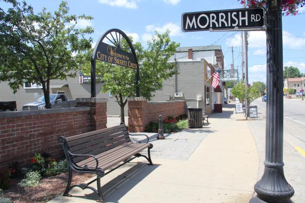 Morrish Rd. sign and downtown view of Swartz Creek, MI.