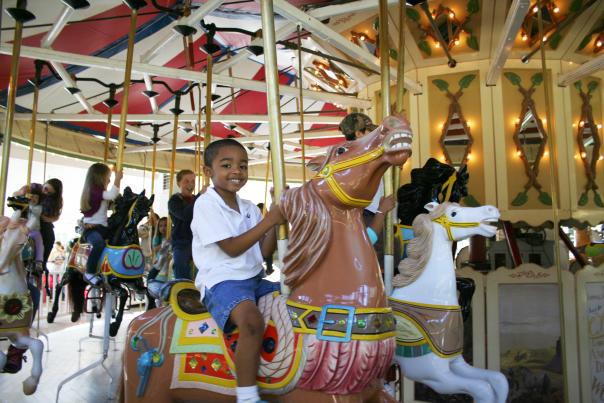 Visitors will enjoy riding their authentic 1912 Charles W. Parker Carousel at Crossroads Village