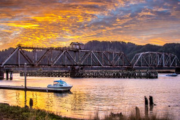 Fishing boat under Cushman Bridge