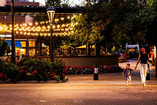 Lady & child walking downtown