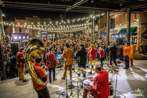 A band playing during FoCoMX at the Old Town Square stage.