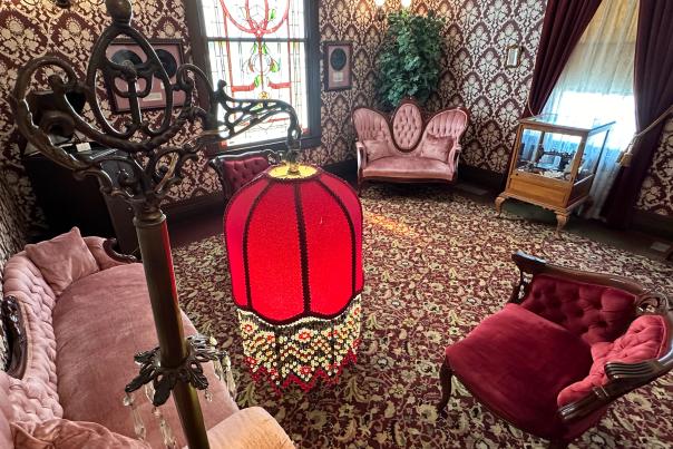 Miss Laura's in Fort Smith features period-style furniture in the parlor.