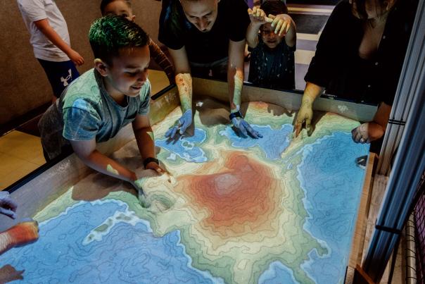 Boy doing a science experiment at Science Central