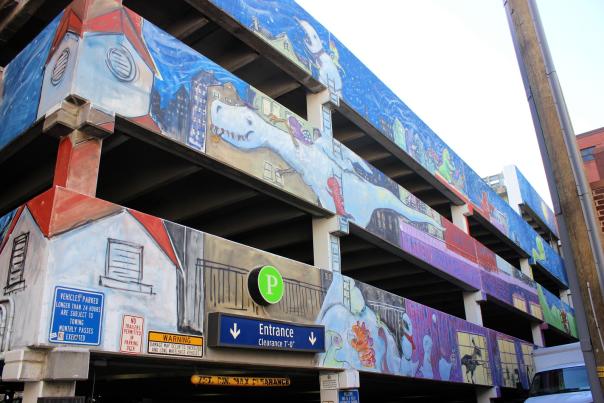 Downtown Frederick parking garage covered in an art mural