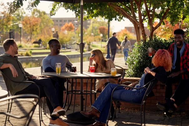 Group sitting at Idiom Brewery patio