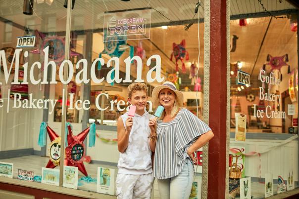 Mom and son eating ice cream on Main Street Galena, IL