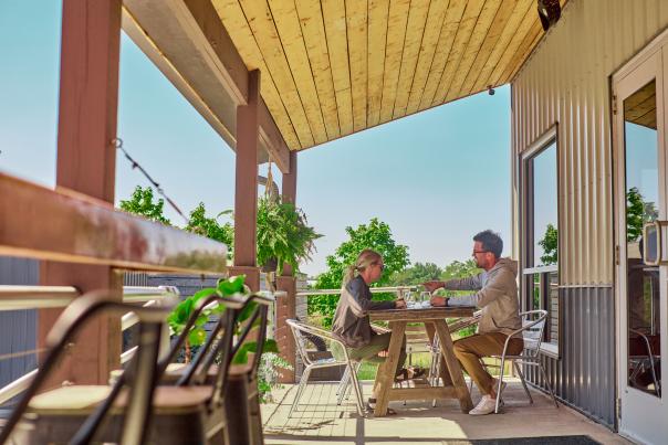 Two people dining at Thriving Thistle in Apple River, IL.