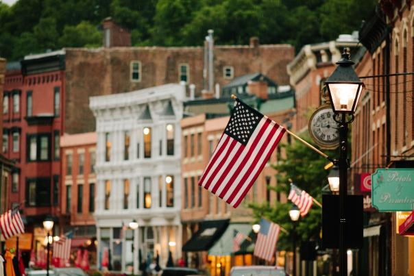 View of buildings on Main Street in Galena, with an American flag.