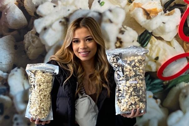 Cornology young lady holding popcorn
