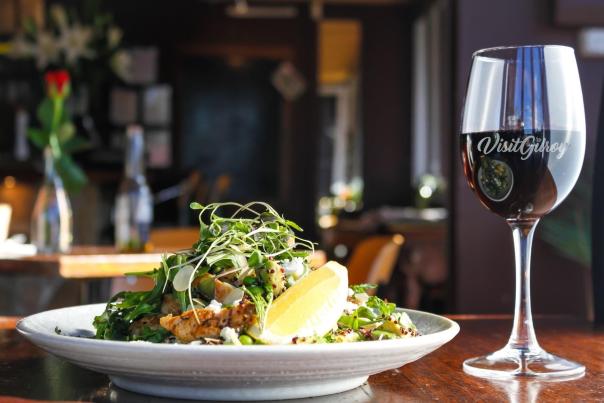 Food pic with Visit Gilroy wine glass