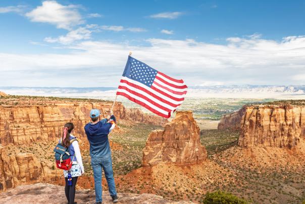 Dillon and Teagan at Colorado National Monument with America Flag