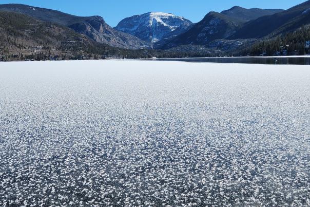 Frozen Grand Lake with Mount Craig in the distance