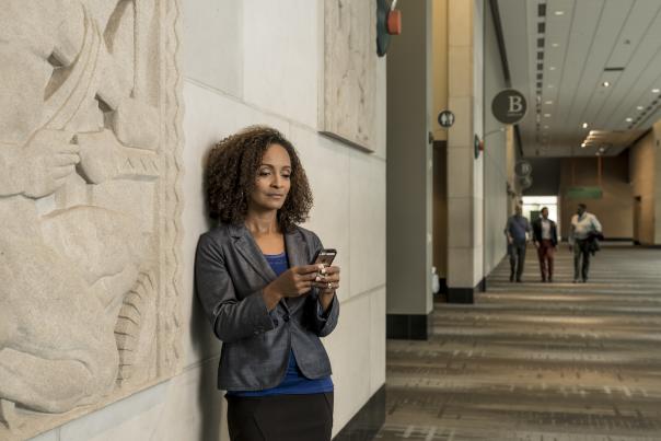 Woman holding cell phone