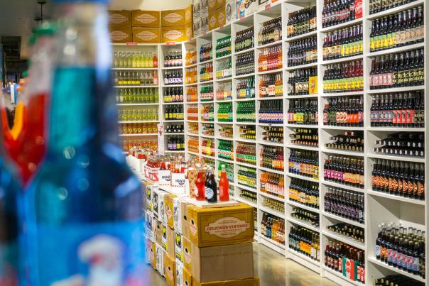 Racks of various kinds of soda at High Tide Soda in the Downtown Market.