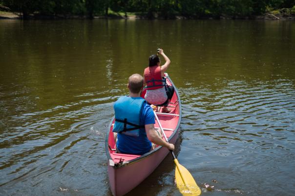 Two People Canoeing