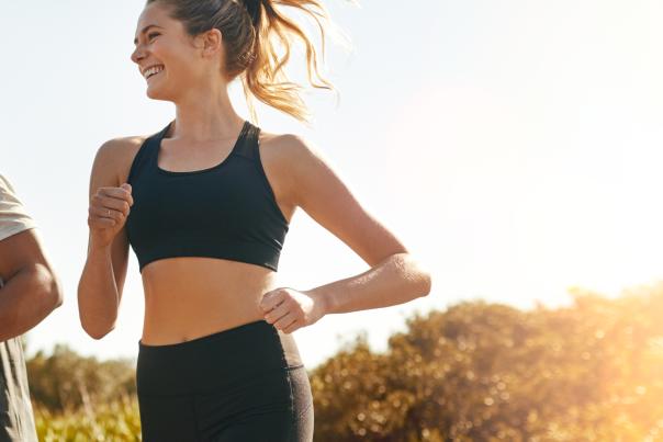 Two people running in nature