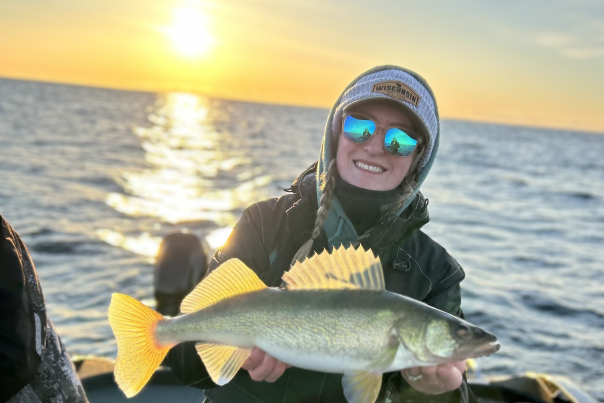 Girl holding a walleye