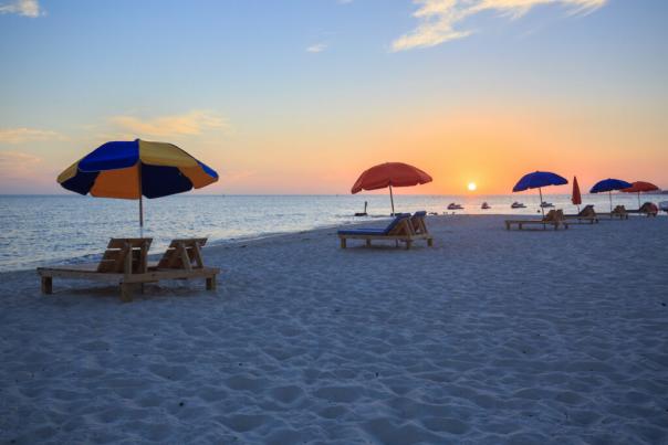 Biloxi Beach Chairs & Umbrellas at sunset