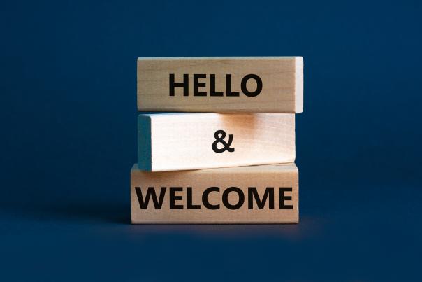 Hello and Welcome on wooden blocks