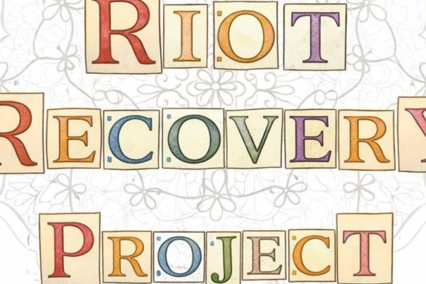The Riot Recovery Project logo with different coloured letters on yellow paper