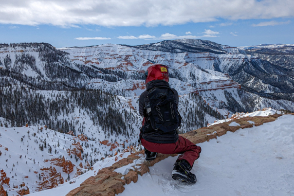 Looking out at the red rock formations of Cedar Breaks National Monument  dusted in snow from the Northern Overlook.