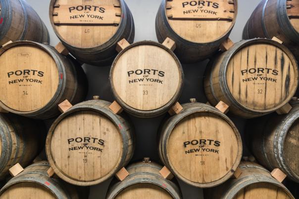 wine barrels stacked from Ports of New York