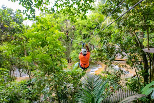 Image of a person zip lining