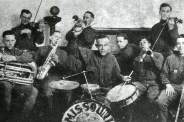 black and white photo of Peaceful Village Band, with Harry Snodgrass on piano