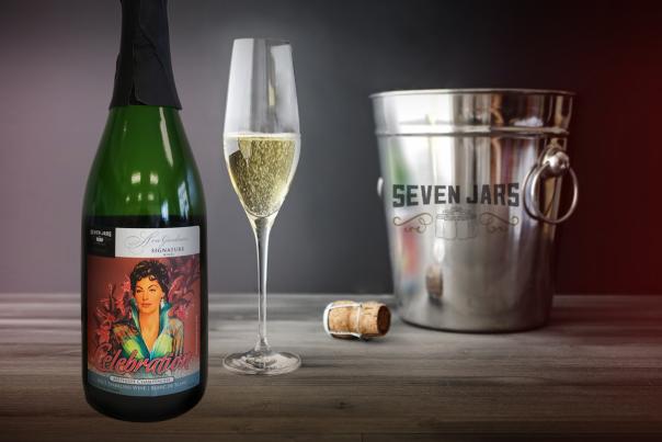 Bottle of Ava Gardner Celebration Sparkling Wine with glass and bucket