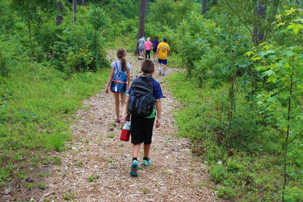 Howell Woods Summer Camp hiking trails and other fun activities.