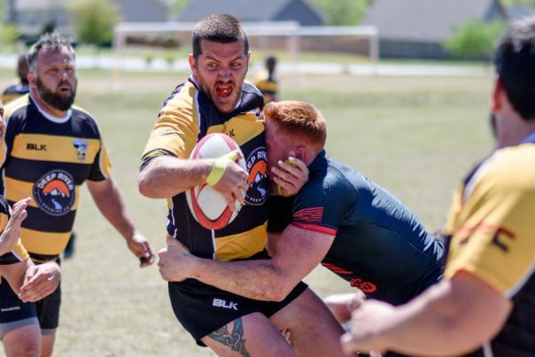 The action is rough at the Cottontown 7 Rugby match held every year in Clayton, NC.
