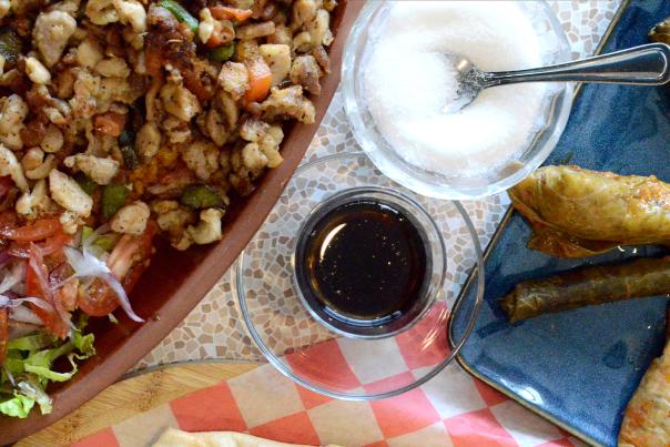 A variety of food sits on a table at Ayasofya Turkish Restaurant.