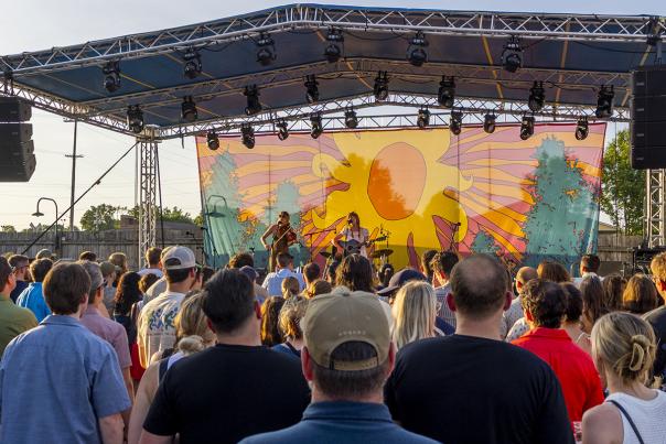Three young women perform on stage at the Bell's Brewery Summer Concert Series in Kalamazoo, MI.