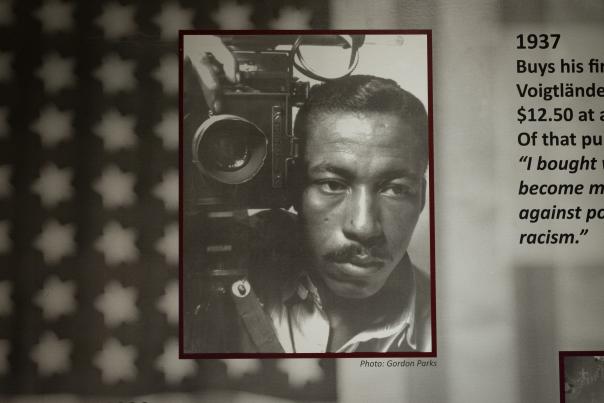 Picture of Gordon Parks by a camera
