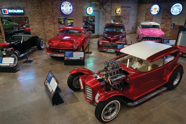 Garage with several classic cars on display