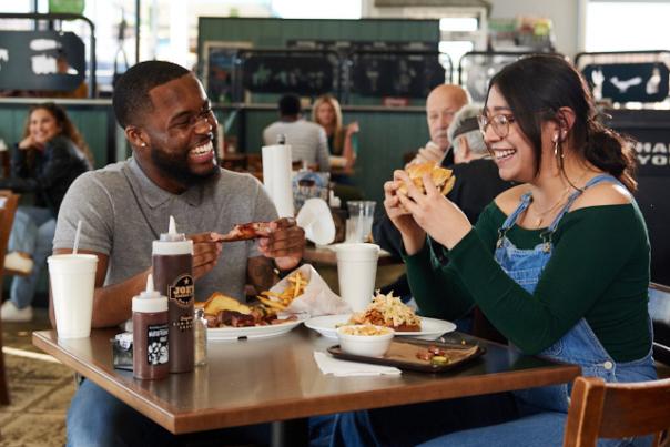 KCK BBQ - Couple Eating Joe's BBQ