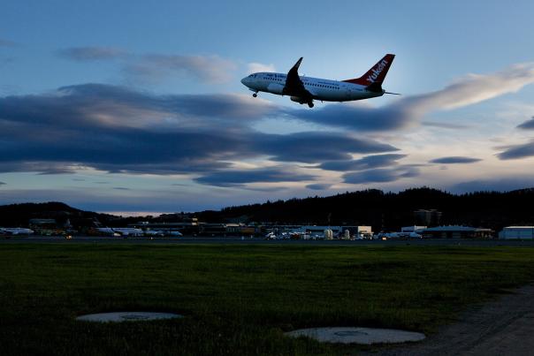Image of Air North plane flying over YLW